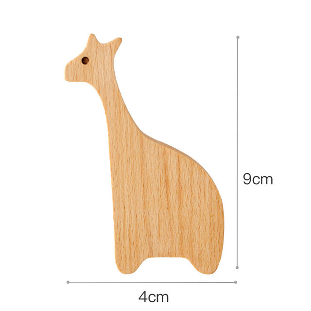 Väggkrok i trä formad som en giraff, 9 × 4 cm
