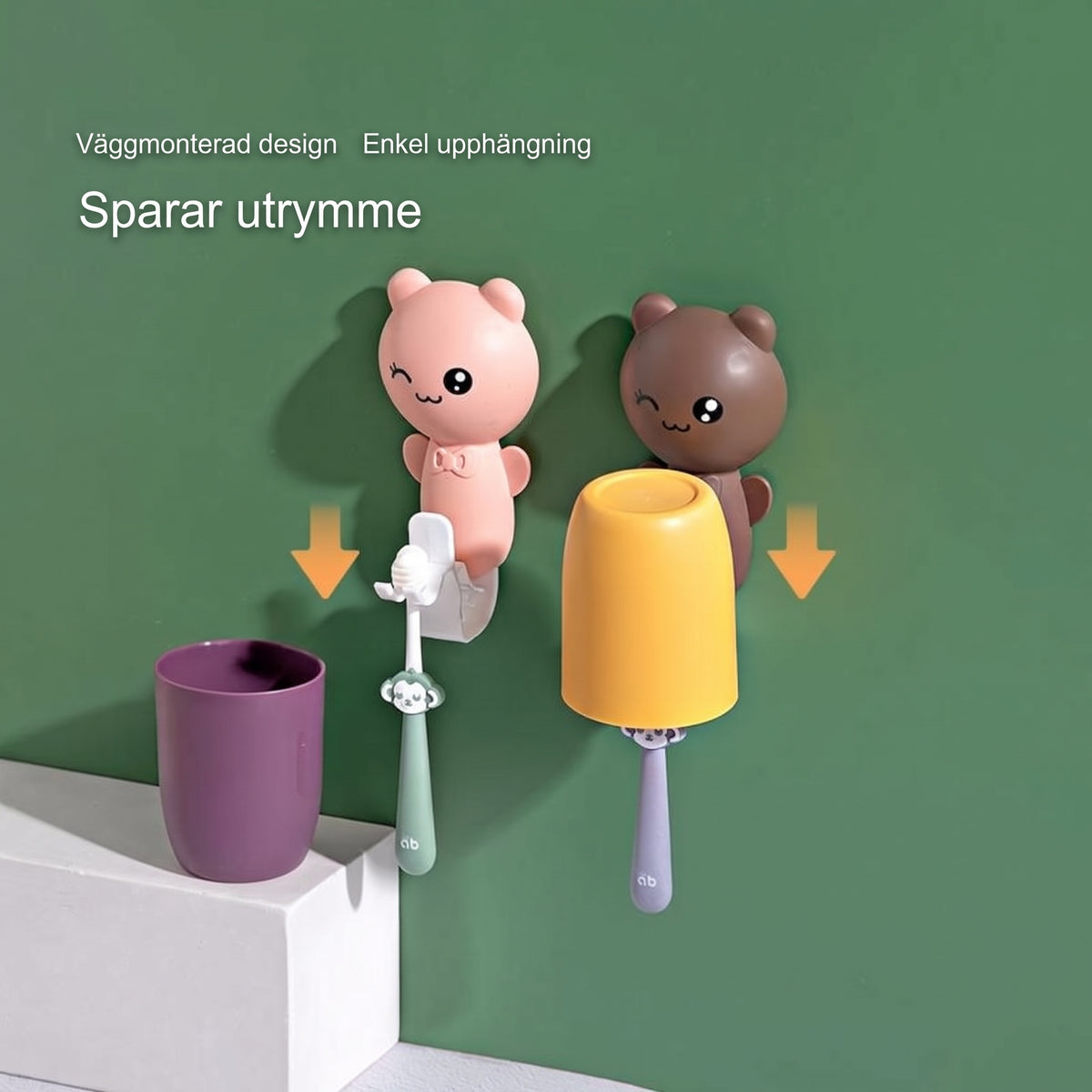 Två tandborsthållare med muggar på väggen i badrummet