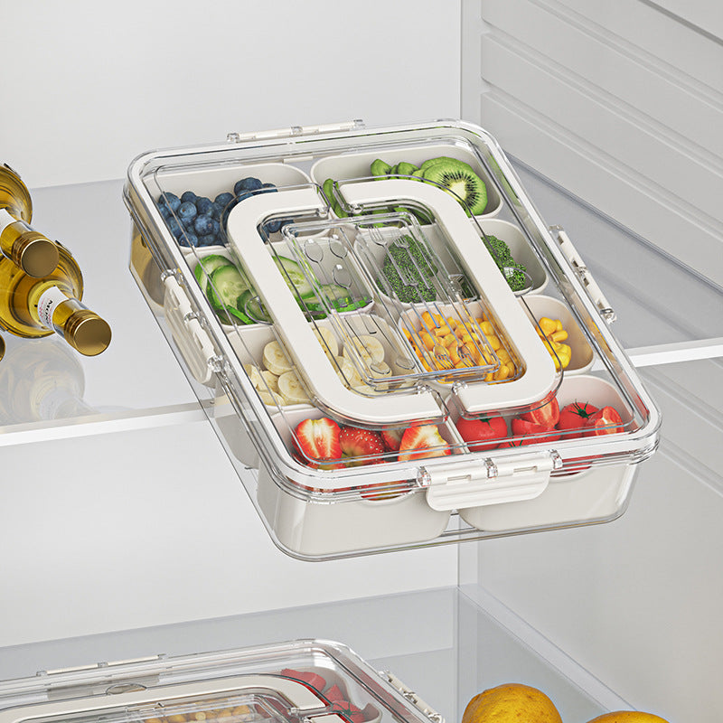 Matlådan med frukt och grönsaker i kylskåpet